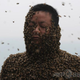 Illustration for article titled Covering Yourself with 460,000 Bees Looks Terrifying